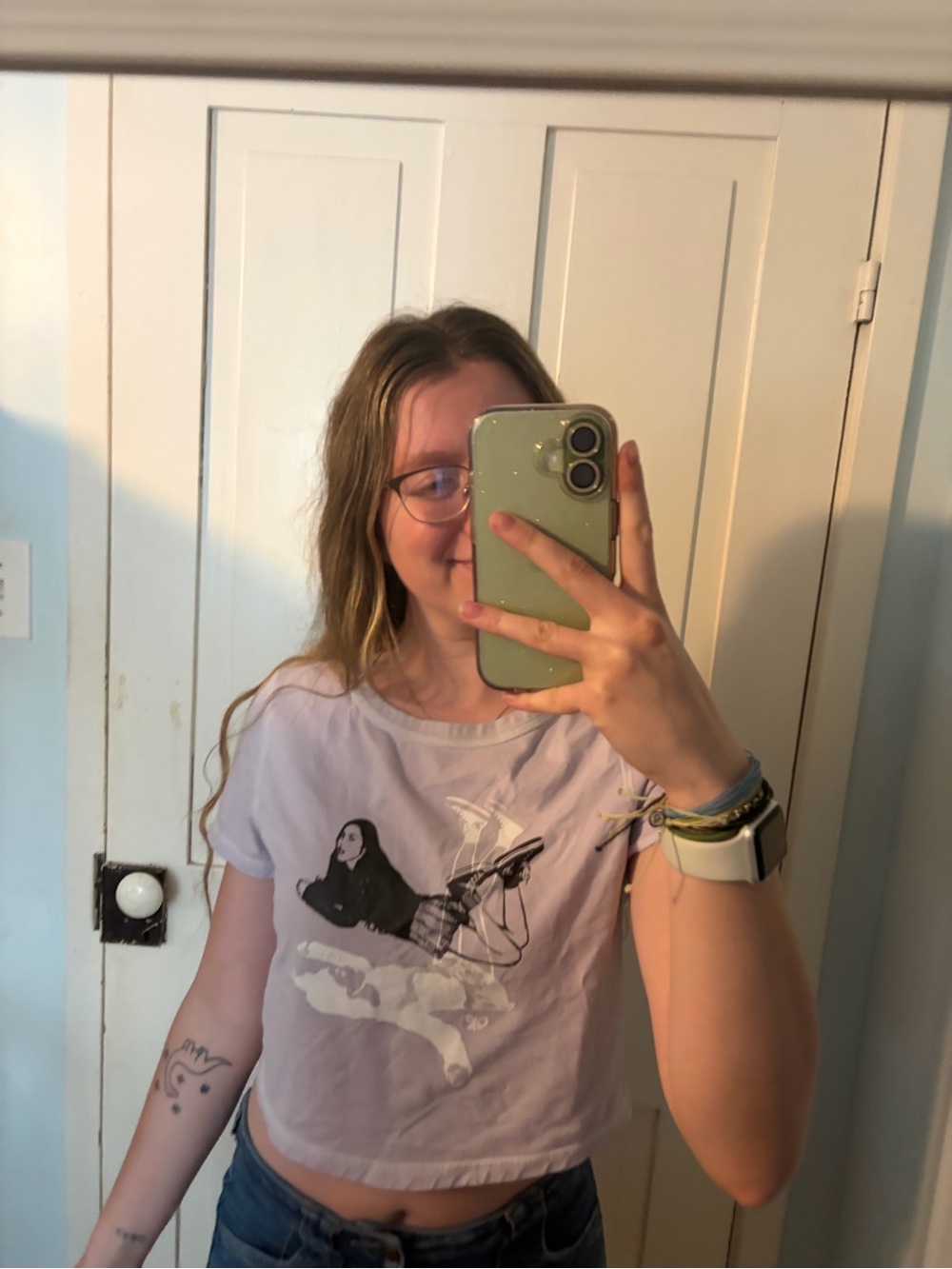 Olivia Rodrigo guts purple crop top